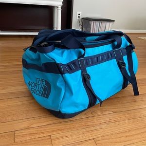 Blue north face duffel bag